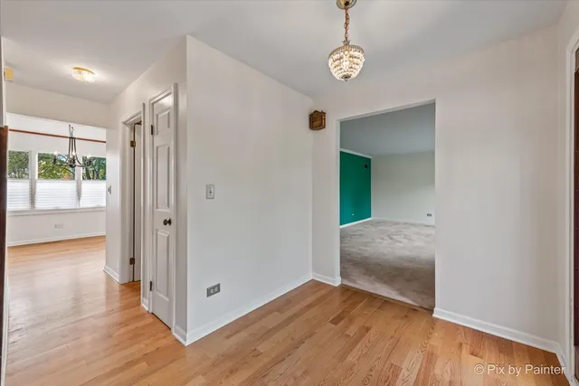 a view of livingroom with hardwood floor and window