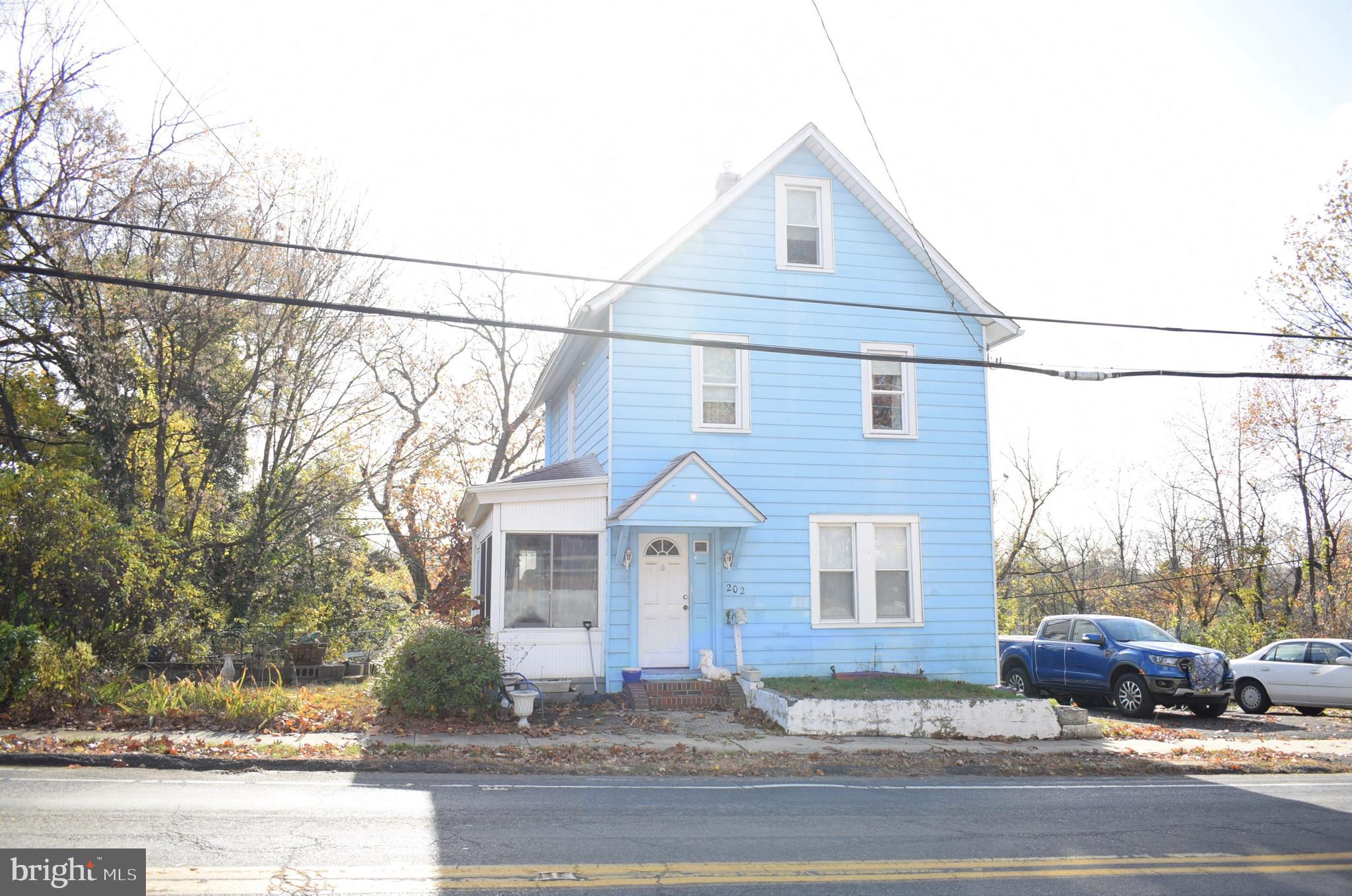 202 Berlin Road Clementon, NJ 08021 - Photo 22 of 25 Front with porch- side yard with patio