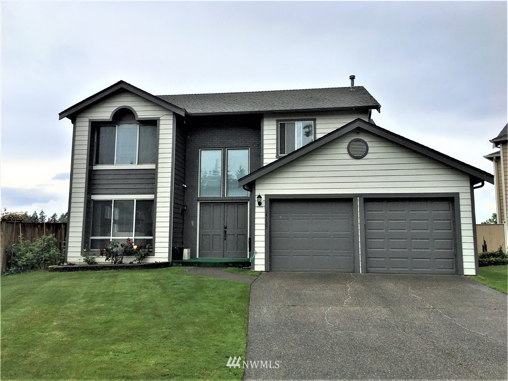 35127 11th Place Southwest Federal Way, WA 98023 - Photo 2 of 31 a front view of a house with a yard