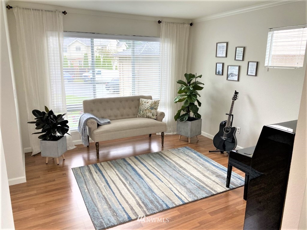 35127 11th Place Southwest Federal Way, WA 98023 - Photo 13 of 31 a living room with furniture and a large window