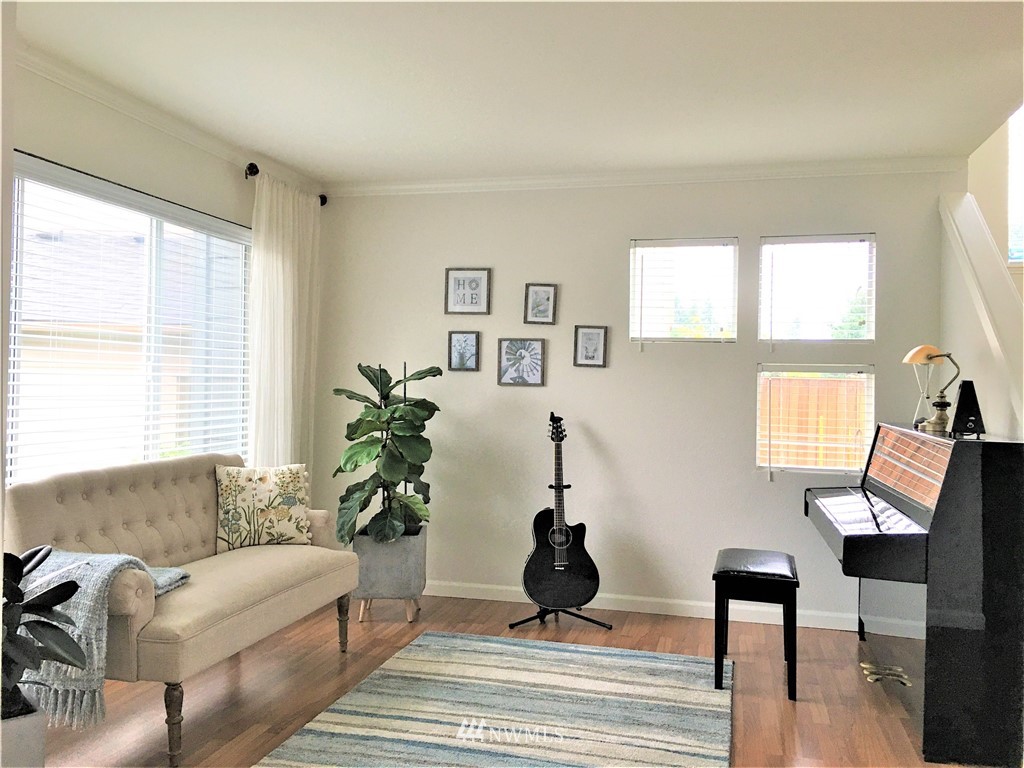 35127 11th Place Southwest Federal Way, WA 98023 - Photo 14 of 31 a living room with furniture and a large window
