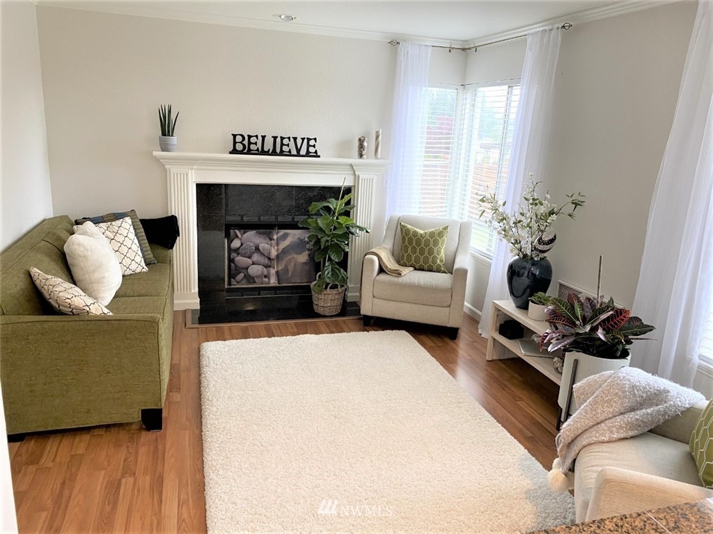 35127 11th Place Southwest Federal Way, WA 98023 - Photo 15 of 31 a living room with furniture and a fireplace