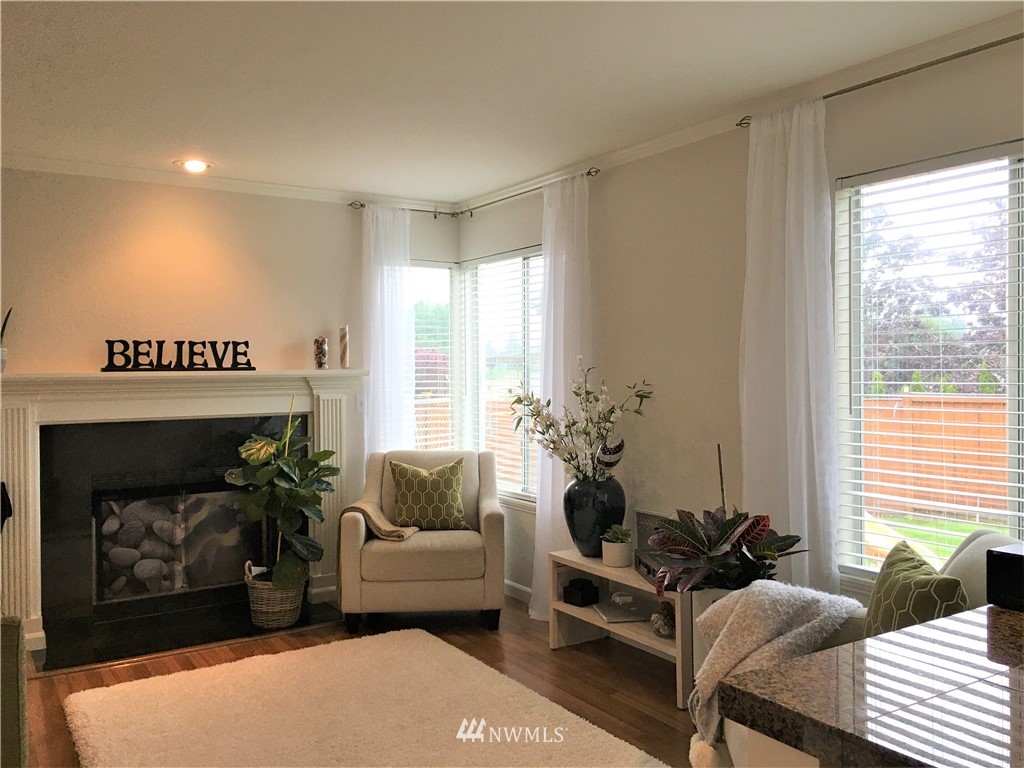 35127 11th Place Southwest Federal Way, WA 98023 - Photo 16 of 31 a living room with furniture and a fireplace