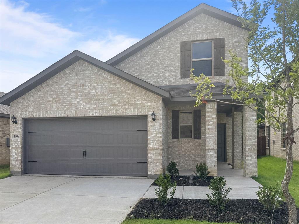 1908 Iris Road Melissa, TX 75454 - Photo 1 of 30 a front view of a house with garden