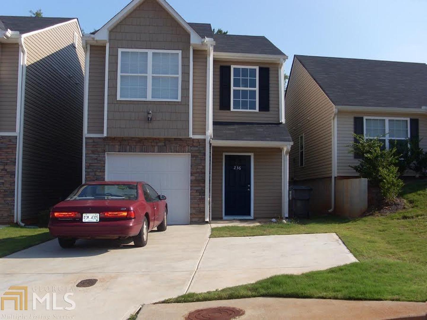 236 Alton Circle Villa Rica, GA 30180 - Photo 1 of 1 a car parked in front of a house