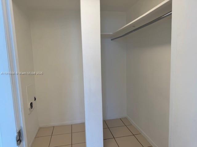 5401 Collins Avenue, Unit 1512 Miami Beach, FL 33140 - Photo 28 of 40 a view of an empty walk in closet