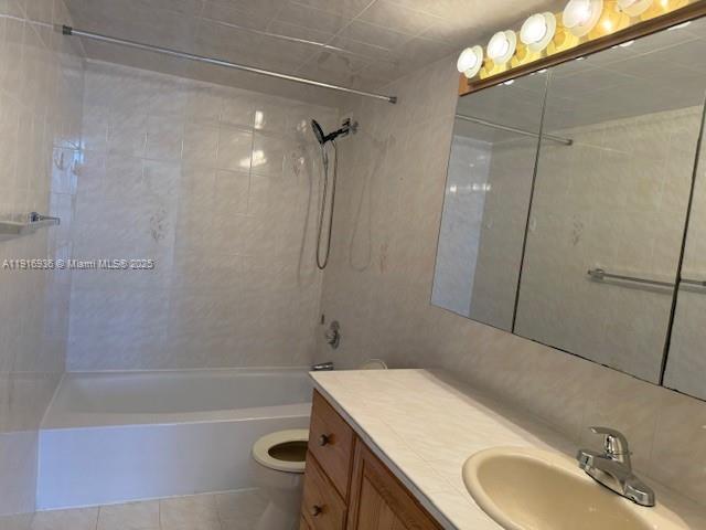5401 Collins Avenue, Unit 1512 Miami Beach, FL 33140 - Photo 30 of 40 a bathroom with a sink toilet and shower