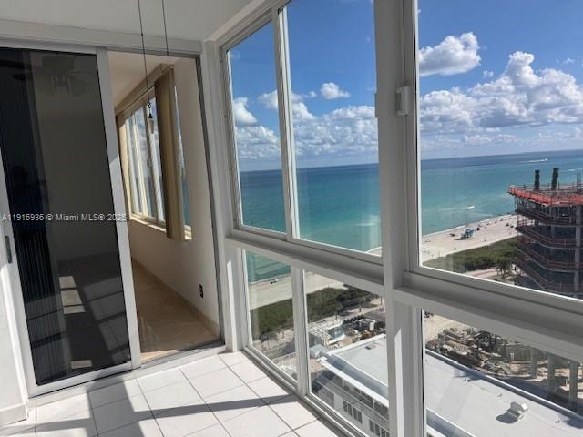 5401 Collins Avenue, Unit 1512 Miami Beach, FL 33140 - Photo 32 of 40 a view of a balcony cabinets and a stove