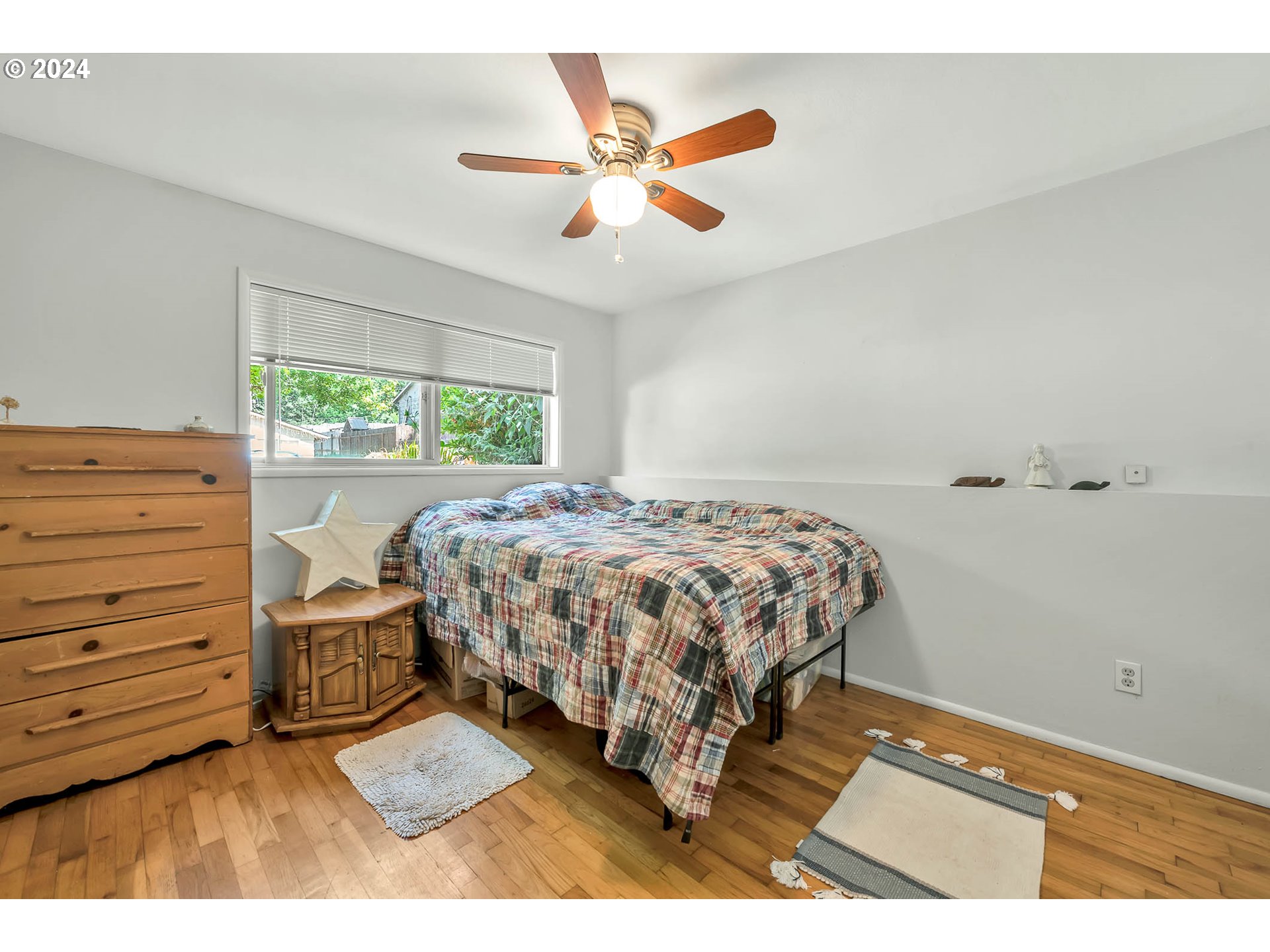 5000 Whiteaker Street Eugene, OR 97405 - Photo 11 of 18 a bedroom with a bed and window