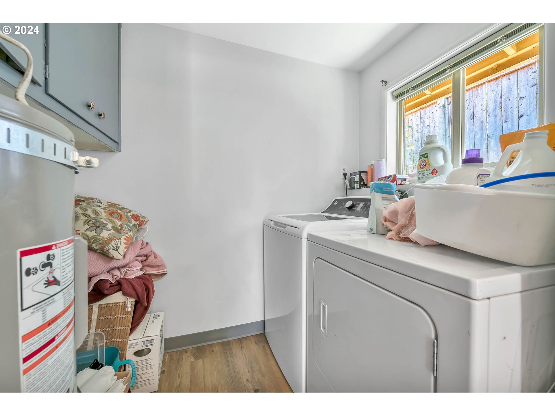 5000 Whiteaker Street Eugene, OR 97405 - Photo 14 of 18 a utility room with a window dryer and washer