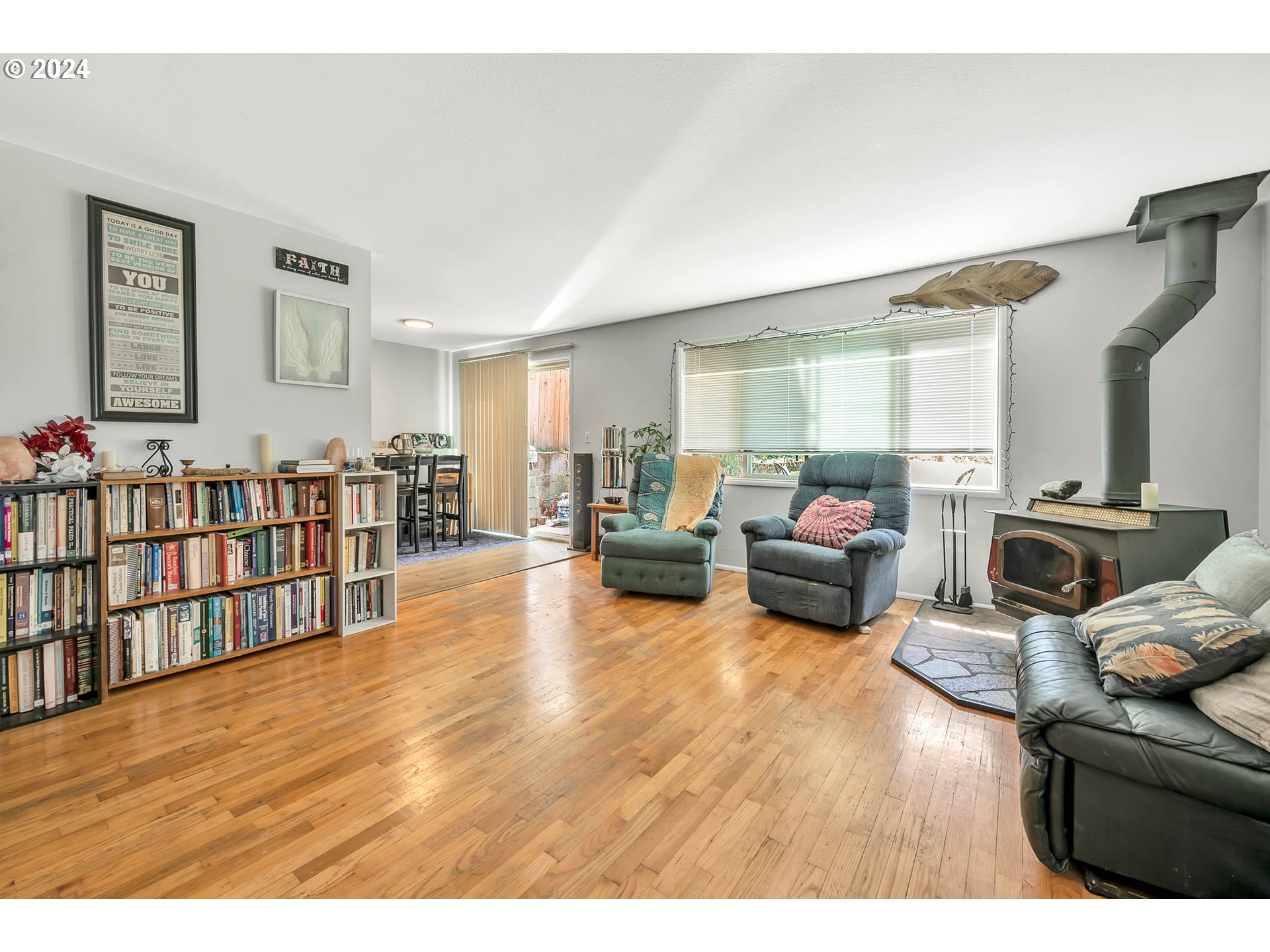 5000 Whiteaker Street Eugene, OR 97405 - Photo 4 of 18 a living room with lots of furniture and kitchen view