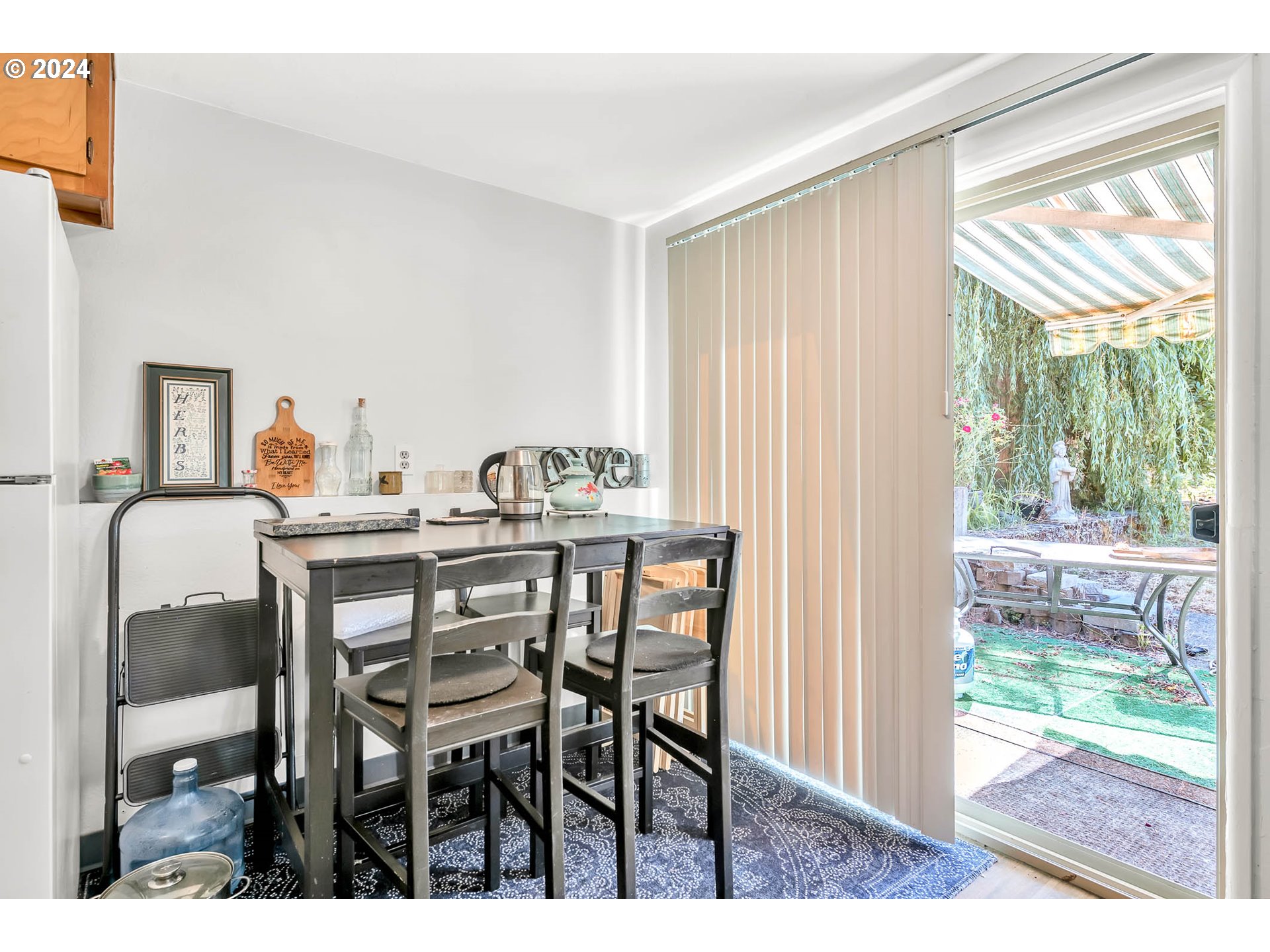 5000 Whiteaker Street Eugene, OR 97405 - Photo 9 of 18 a view of a dining room with furniture window and outside view