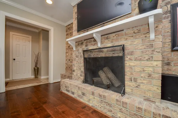 a living room with a fireplace in it