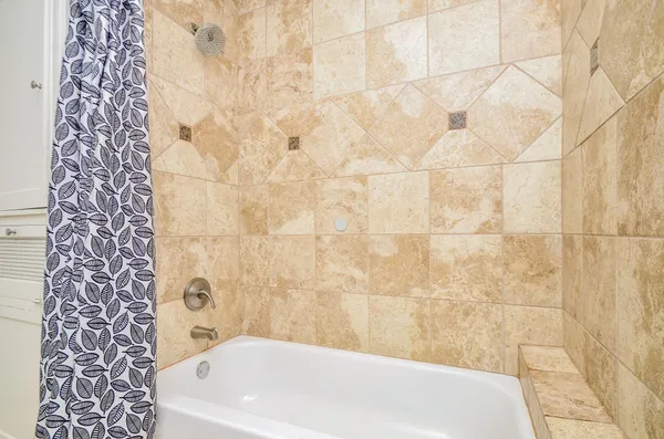 a bathroom with a bathtub