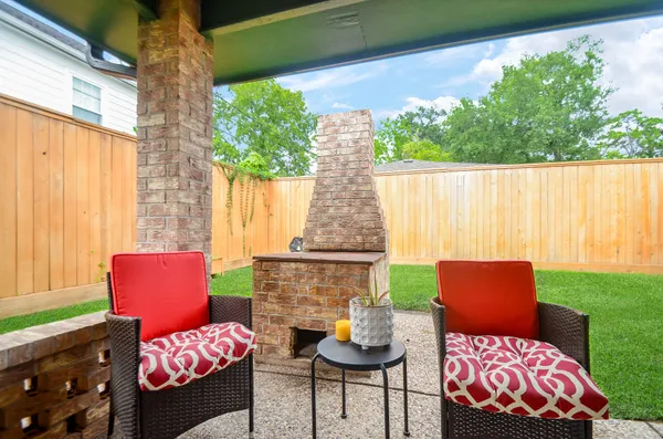 a outdoor living space with furniture and a potted plant