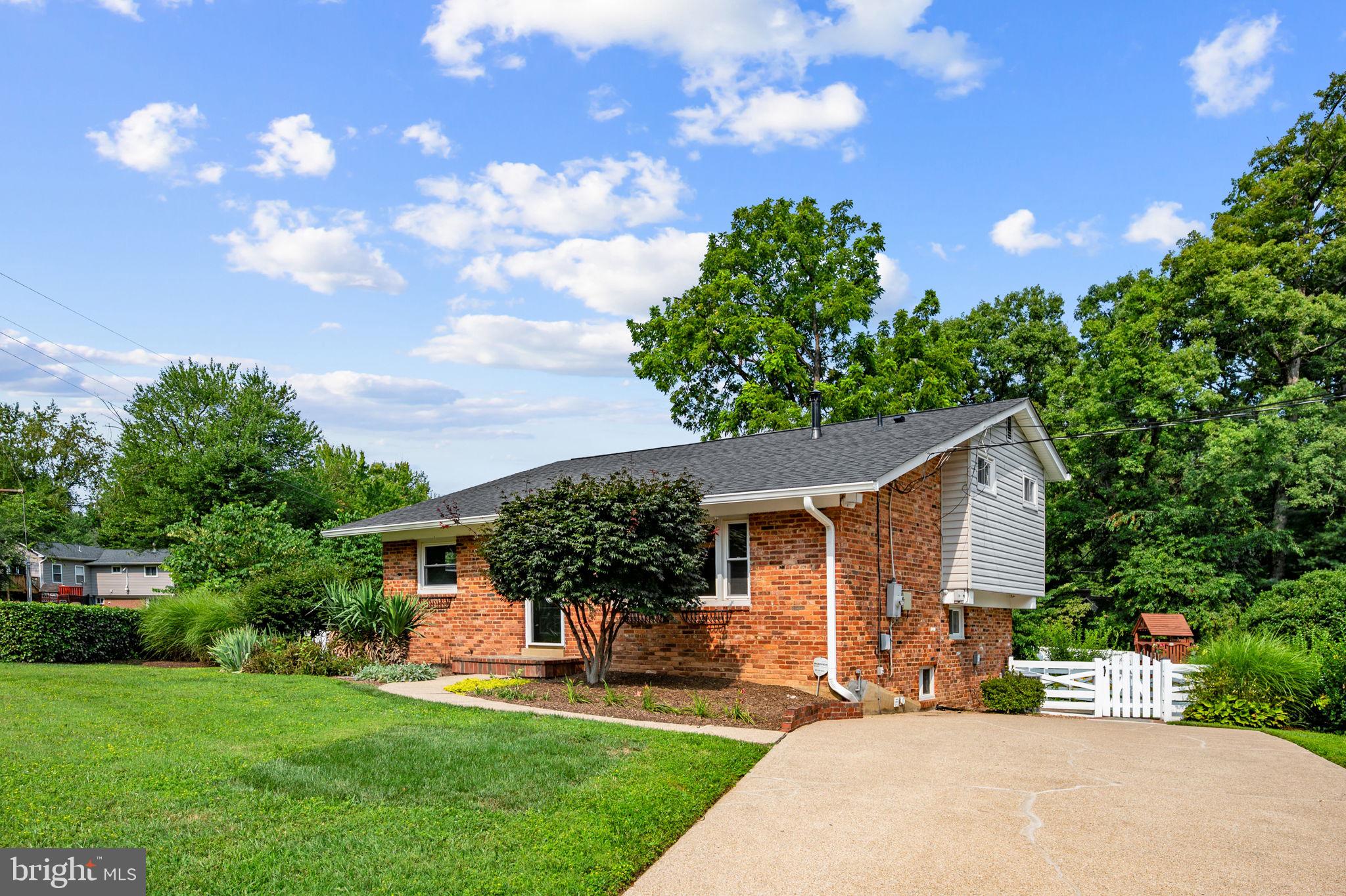 4216 Sideburn Road Fairfax, VA 22030 - Photo 3 of 47 Welcome Home - Large Concrete Driveway