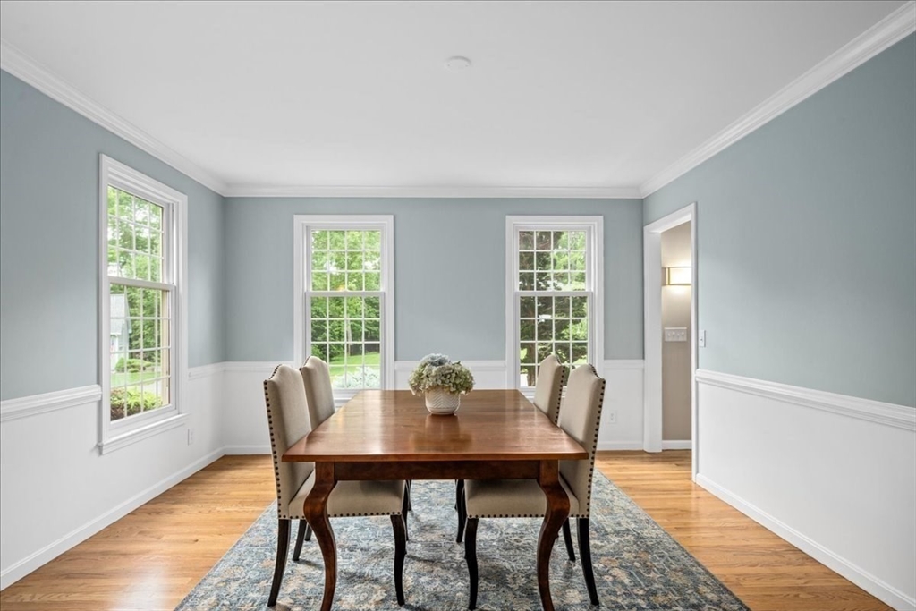 4 Round Table Road Shrewsbury, MA 01545 - Photo 13 of 41 a view of a dining room with furniture and wooden floor