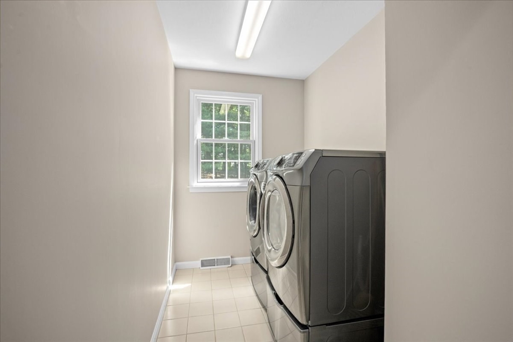 4 Round Table Road Shrewsbury, MA 01545 - Photo 17 of 41 a utility room with dryer and washer