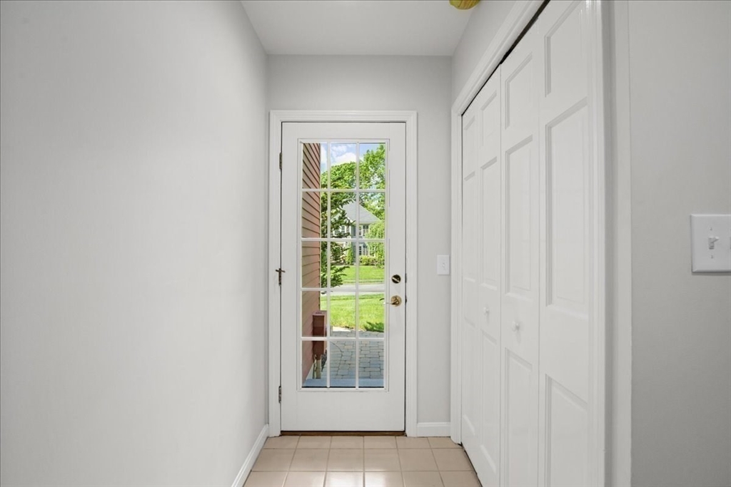 4 Round Table Road Shrewsbury, MA 01545 - Photo 18 of 41 a view of a hallway with wooden floor and a window