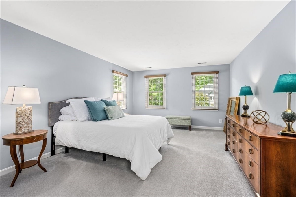 4 Round Table Road Shrewsbury, MA 01545 - Photo 20 of 41 a bedroom with a bed and a window in it