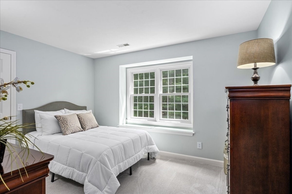 4 Round Table Road Shrewsbury, MA 01545 - Photo 24 of 41 a bedroom with a bed and a window