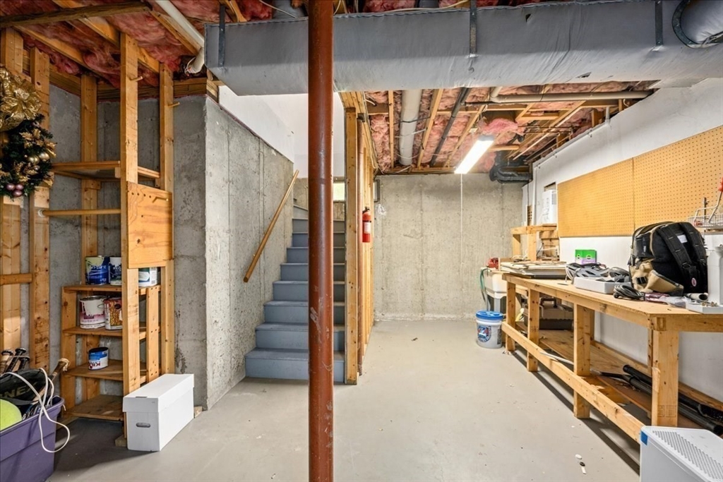 4 Round Table Road Shrewsbury, MA 01545 - Photo 30 of 41 a kitchen with a stove and a white refrigerator