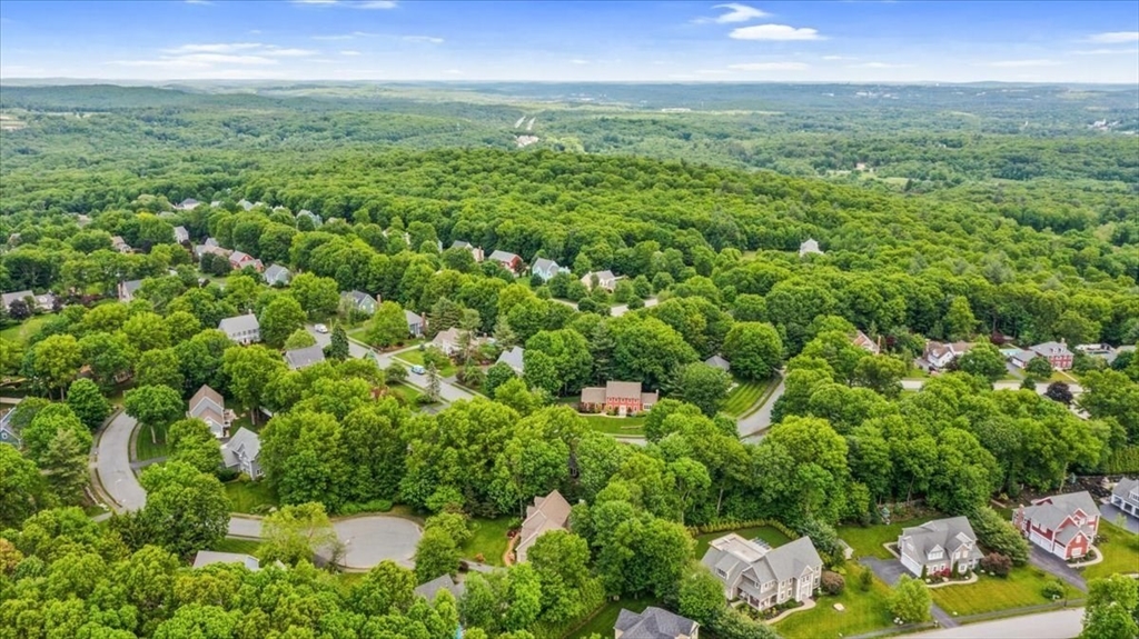 4 Round Table Road Shrewsbury, MA 01545 - Photo 3 of 41 a view of a garden with an outdoor space