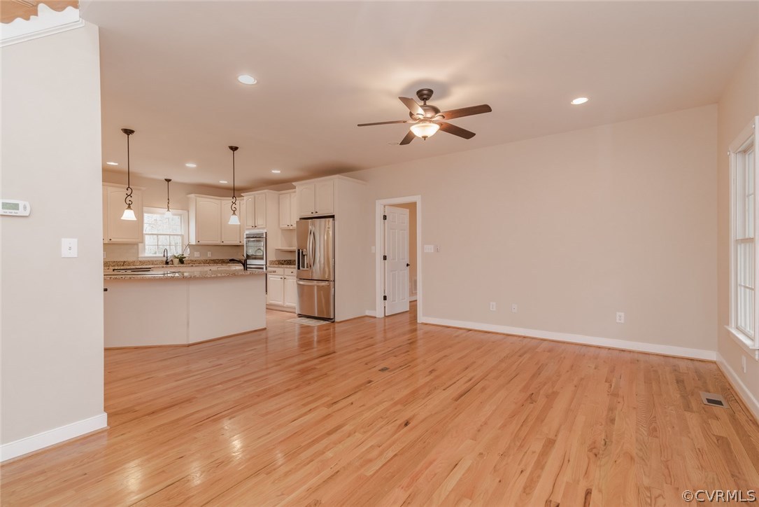 20843 Beaver Dam Road Beaverdam, VA 23015 - Photo 11 of 50 a view of kitchen with wooden floor and window