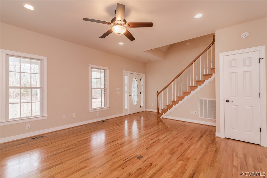 20843 Beaver Dam Road Beaverdam, VA 23015 - Photo 14 of 50 a view of an empty room with wooden floor and fan