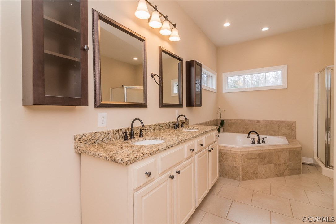 20843 Beaver Dam Road Beaverdam, VA 23015 - Photo 16 of 50 a bathroom with a granite countertop sink mirror and bathtub