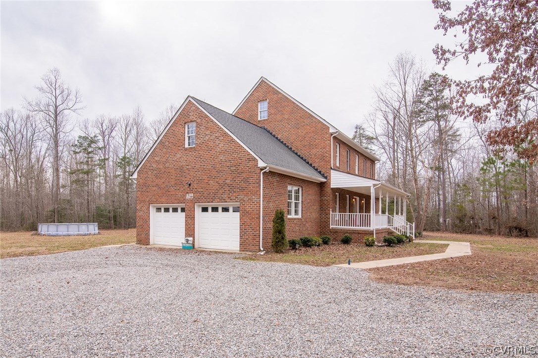 20843 Beaver Dam Road Beaverdam, VA 23015 - Photo 2 of 50 a front view of a house with a yard