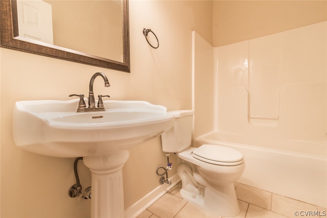 20843 Beaver Dam Road Beaverdam, VA 23015 - Photo 22 of 50 a bathroom with a sink a toilet and shower