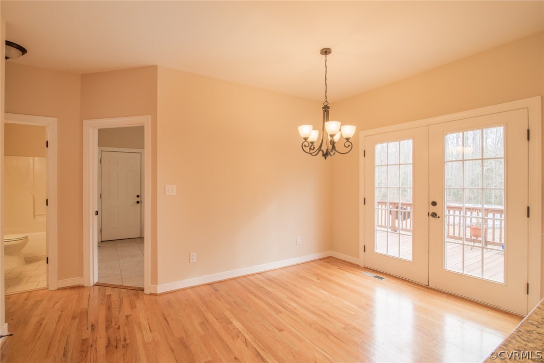 20843 Beaver Dam Road Beaverdam, VA 23015 - Photo 28 of 50 a view of empty room with wooden floor and fan