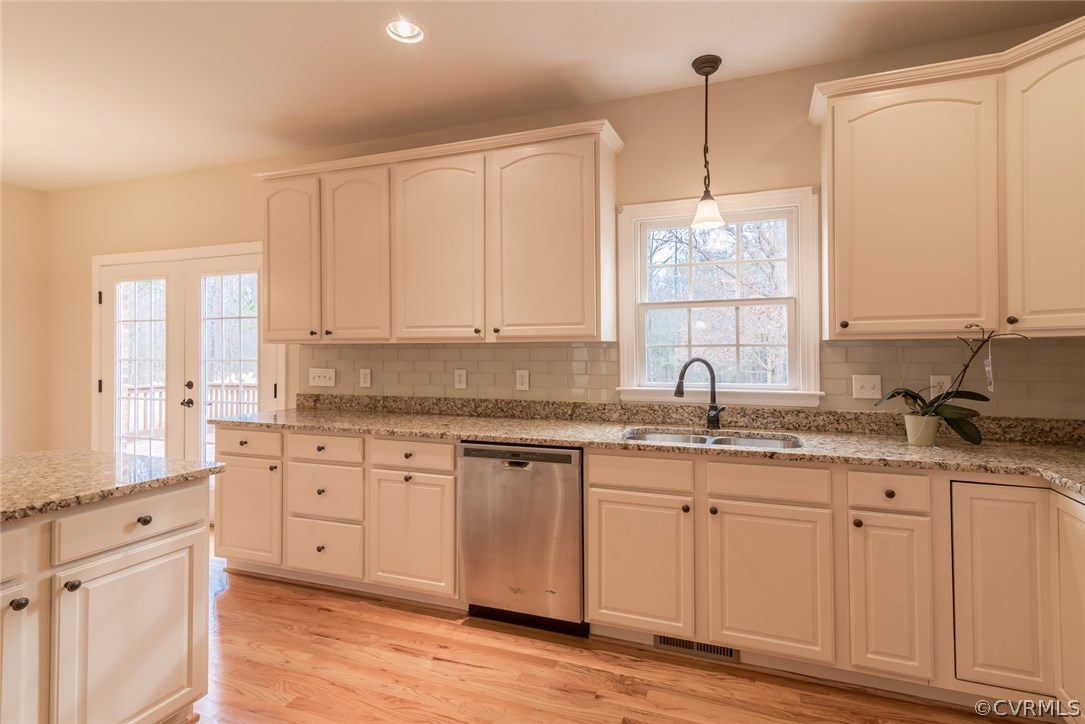 20843 Beaver Dam Road Beaverdam, VA 23015 - Photo 31 of 50 a kitchen with granite countertop white cabinets white appliances and sink