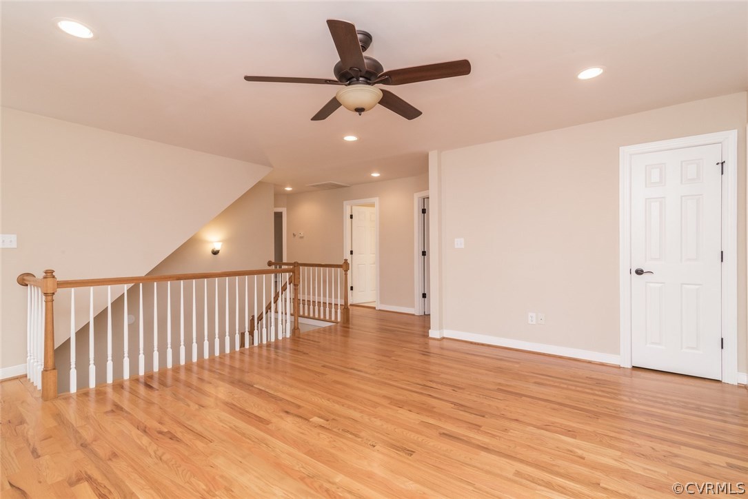 20843 Beaver Dam Road Beaverdam, VA 23015 - Photo 36 of 50 a view of an empty room with wooden floor and a ceiling fan