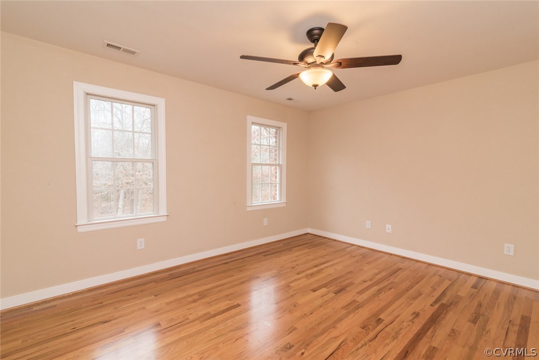 20843 Beaver Dam Road Beaverdam, VA 23015 - Photo 41 of 50 a view of an empty room with wooden floor and a window
