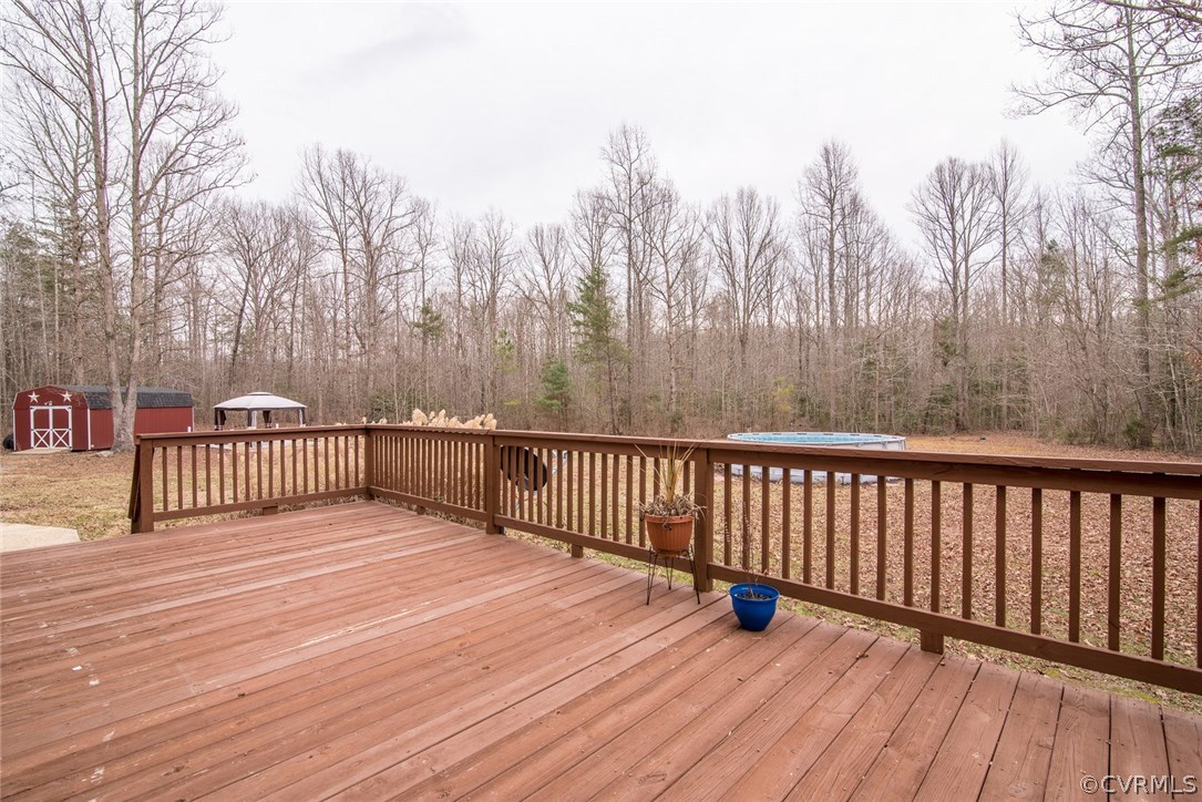 20843 Beaver Dam Road Beaverdam, VA 23015 - Photo 47 of 50 a view of a balcony with wooden floor and fence