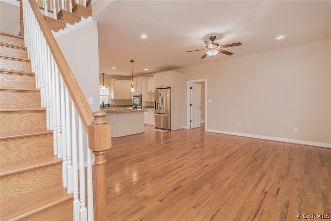20843 Beaver Dam Road Beaverdam, VA 23015 - Photo 10 of 50 a view of a kitchen with wooden floor and a ceiling fan