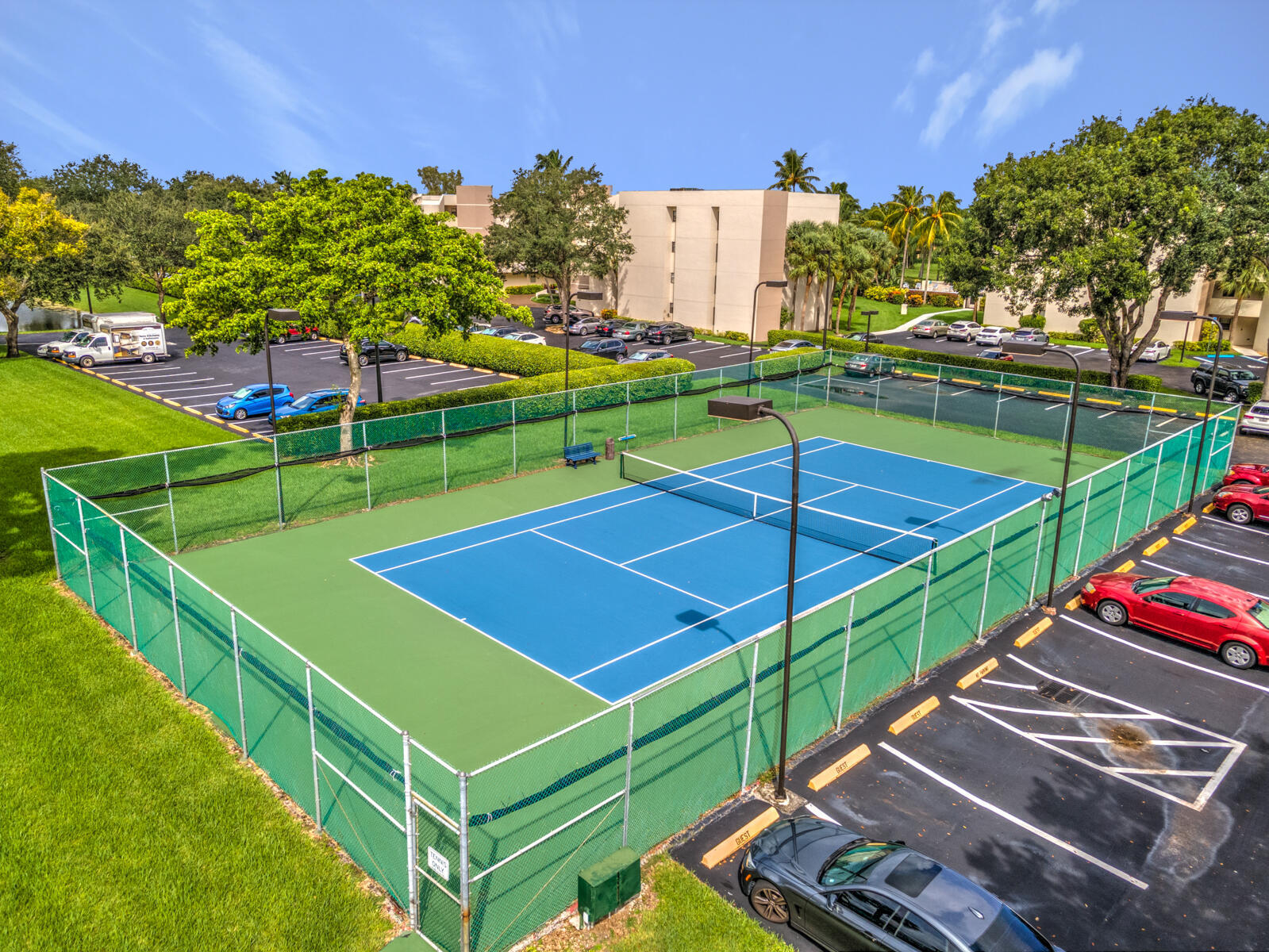 5800 Camino Del Sol, Unit 103 Boca Raton, FL 33433 - Photo 24 of 28 TENNIS-LIGHTS FOR NIGHT PLAYING