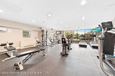 28 Riverside Avenue, Unit 2H Red Bank, NJ 07701 - Photo 26 of 36 a view of a room with gym equipment