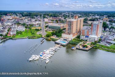28 Riverside Avenue, Unit 2H Red Bank, NJ 07701 - Photo 34 of 36 a view of a lake with a nearby beach