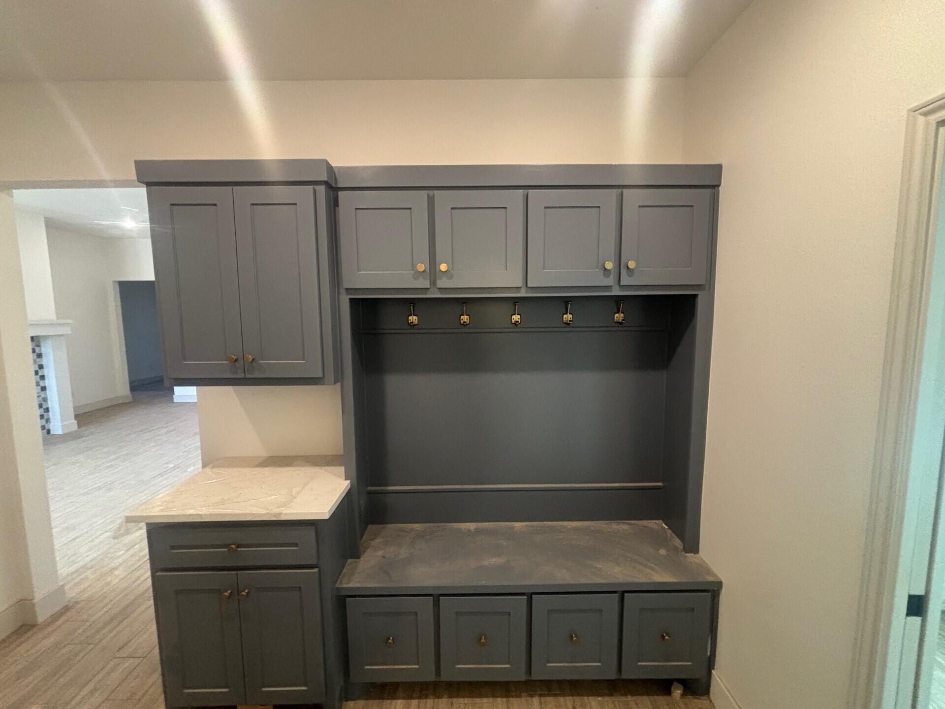 3616 119th Street Lubbock, TX 79423 - Photo 7 of 9 a bathroom with a sink and a mirror