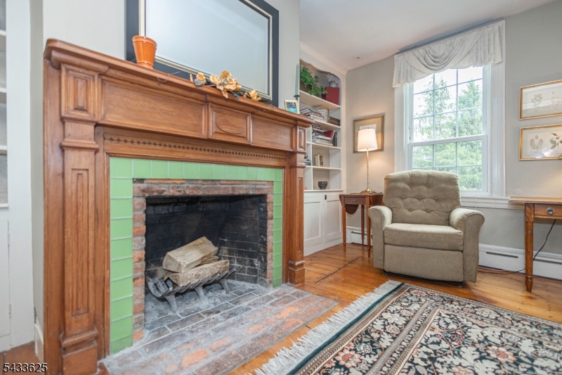 449 Stamets Road Milford, NJ 08848 - Photo 11 of 44 a living room with furniture and a fireplace