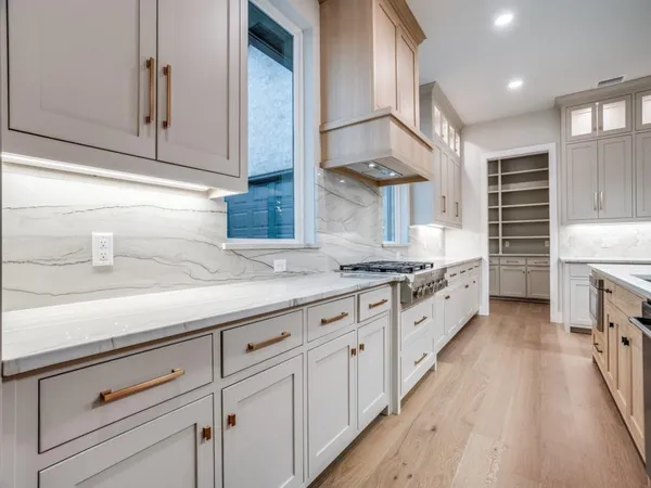 a view of cabinets and window