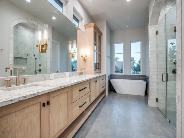 a bathroom with a bathtub and window