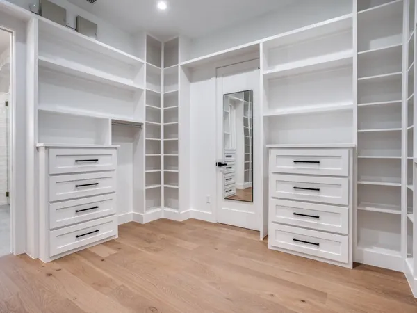 a view of a kitchen with cabinets