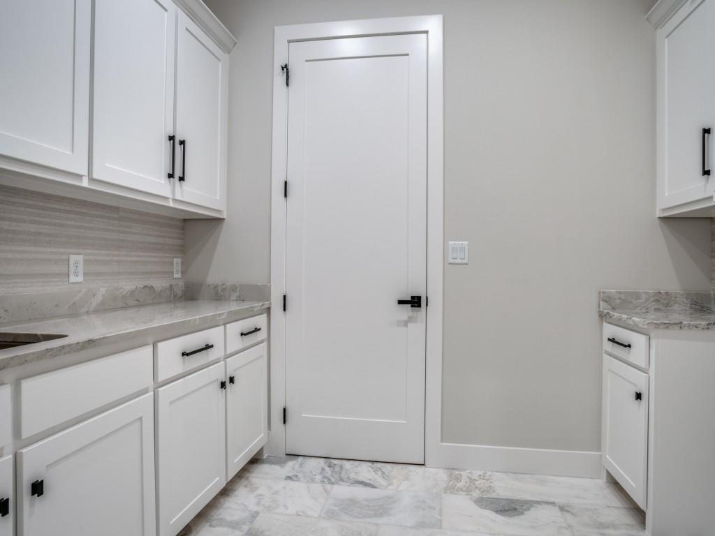 2424 Bellview Circle Tyler, TX 75709 - Photo 21 of 39 a view of a kitchen with cabinets