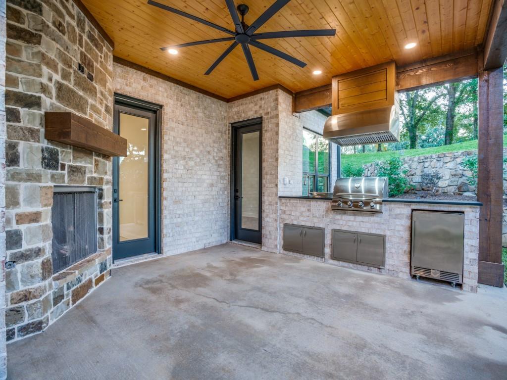2424 Bellview Circle Tyler, TX 75709 - Photo 38 of 39 a large room with a large window and kitchen view