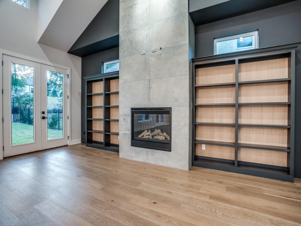 2424 Bellview Circle Tyler, TX 75709 - Photo 6 of 39 a view of a livingroom with wooden floor and a large window