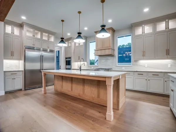 a room with cabinets and a window